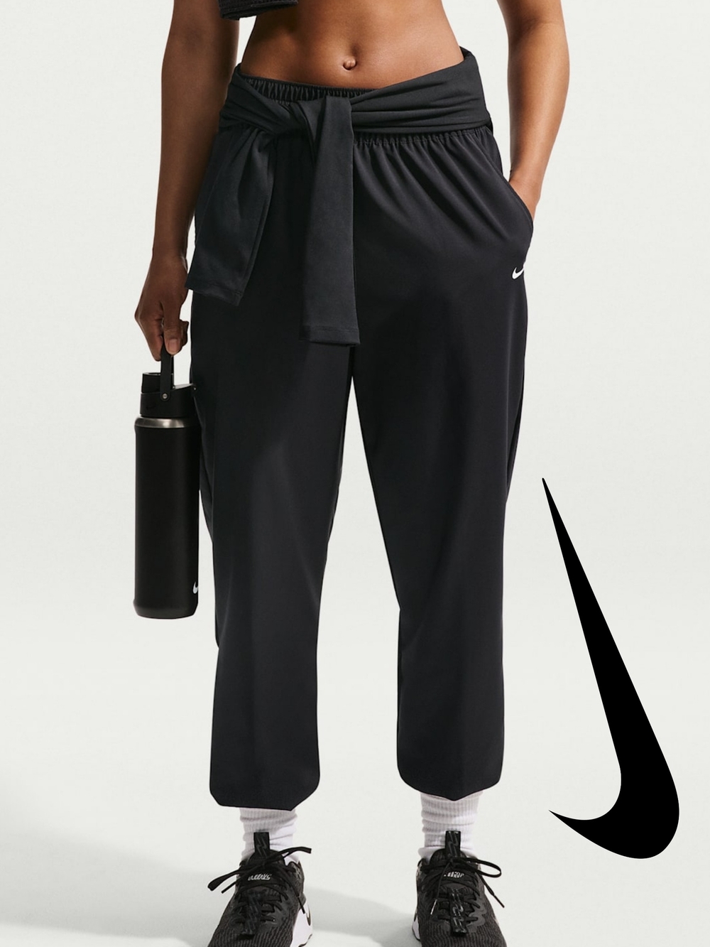 NWT Nike One
Women's Dri-FIT High-Waisted 7/8 Joggers- BLACK
